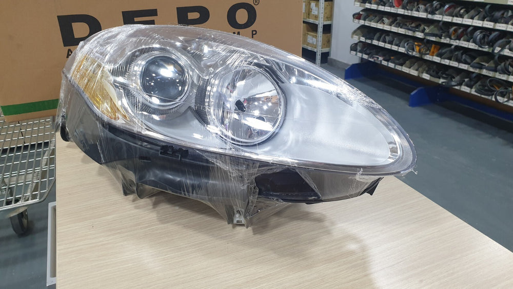COPPIA FARI DEPO FIAT BRAVO II FINO AL 2009 PARABOLA CROMATA FRECCE ARANCIONI